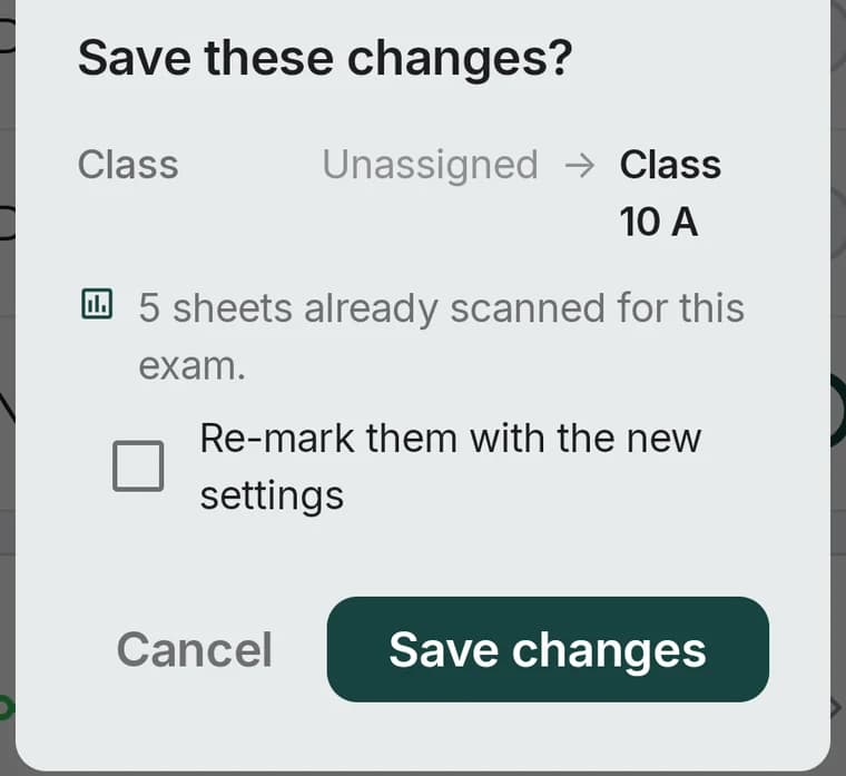 A confirmation dialog showing Class changing from Unassigned to Class 10 A with an option to re-mark 5 already scanned sheets