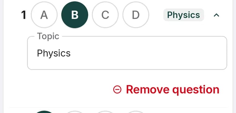 A question row expanded in the answer key showing its topic field and a Remove question button